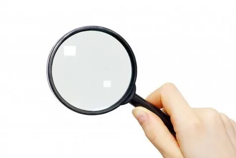 Premium Photo Hand with magnifying glass and puzzle isolated