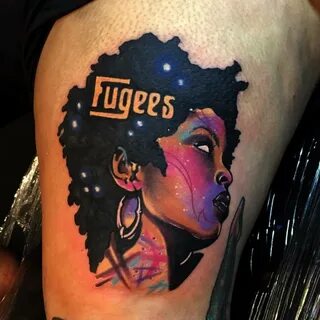 Psychedelic style Fugees inspired tattoo on the left