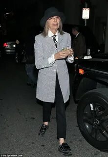 Diane Keaton heads out to dinner in signature black cap