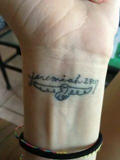 A tattoo I designed myself to symbolize my faith. It's a dov