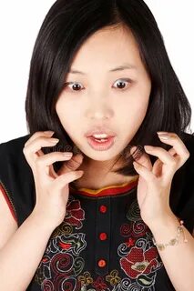 Surprised Asian Housewife in Apron Stock Image - Image of em