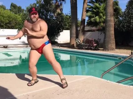 Video of a guy dancing in a speedo to 'Can't Stop The Feelin