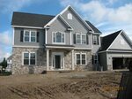 Nit's News: Siding, Stone and Primed Colonial house exterior