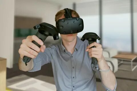 VR Goggles With Hand-Held Controllers Offer Architects A Who