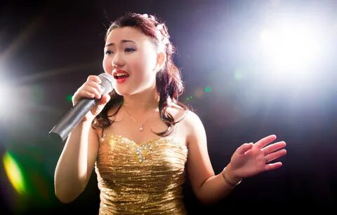 Asian girl does singer impressions