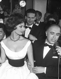 5/15/1959 Cannes, France: Italian actress Sophia Loren and h