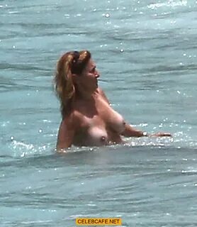 Judge Marilyn Milian caught topless at a Caribbean Beach