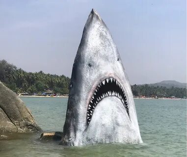 Artist Transforms Sharp Rock Rising From the Waters on a Bea