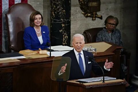 Biden pushes 15% minimum tax for corporations in his State of the Union address 