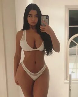 Demi Rose shows off her famous curves in pouty swimwear self