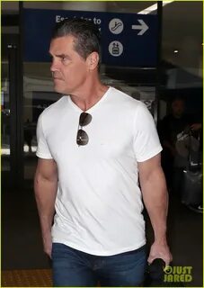 Josh Brolin Flexes His Muscles Flying Into Los Angeles: Phot