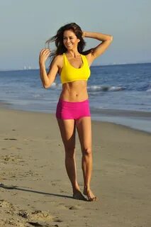 BROOKE BURKE in the Set of Her Brooke Burke Body App at a Beach in Malibu 1...