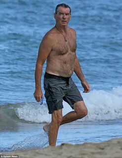 Shirtless Pierce Brosnan tops up his tan in Hawaii with son 