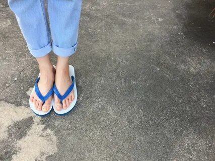 Blue Flip Flops Fashion. Woman Wear Blue Sandals And Blue Je