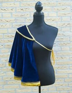 Shoulder cape refernce: Needs to be dark red and longer, abo