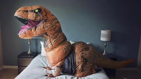 Woman Does Boudoir Photo Shoot in T. Rex Costume as Wedding 