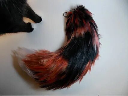 Red Wolf-Style Yarn Tail For Sale! by WyrmsRoost on DeviantA