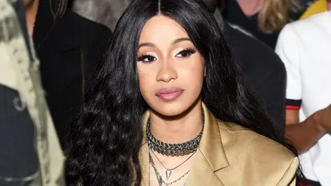 Cardi B Transforms with Waist-Grazing Platinum Blonde Hair o