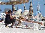 Erykah Badu Goes Blonde & Flaunts Her Bikini Body In Miami R