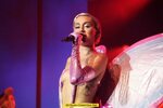 Miley Cyrus almost topless on a stage at 2015 Adult Swim Upf