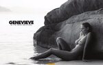 Genevieve Morton sitting nude on a beach