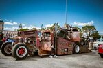 Car hauler ratrod with open front wheels, slammed to the gro