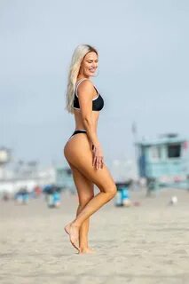 cj 'lana' perry shows off her beach body in a black bikini w