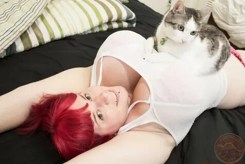 Kitten resting on boobs - Drunk Tiki