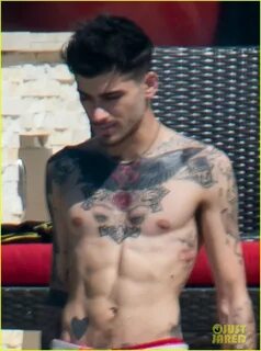 Zayn Malik Cools Off Shirtless in Miami, Shares New Freestyl