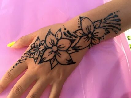 Detailed flower henna tattoo design. Medium to large size He