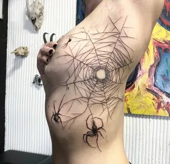 Spiderweb tattoo boobs