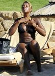 Mary J Blige shows off her sizzling bikini body as she suns 