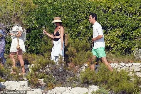 Erica Packer with a mystery man in the South of France Expre