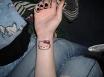 26 Awesome Kitty Wrist Tattoos