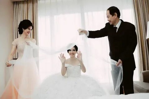 Risski & Lynn Wedding Day by Dhika MA Fotografia Bridestory