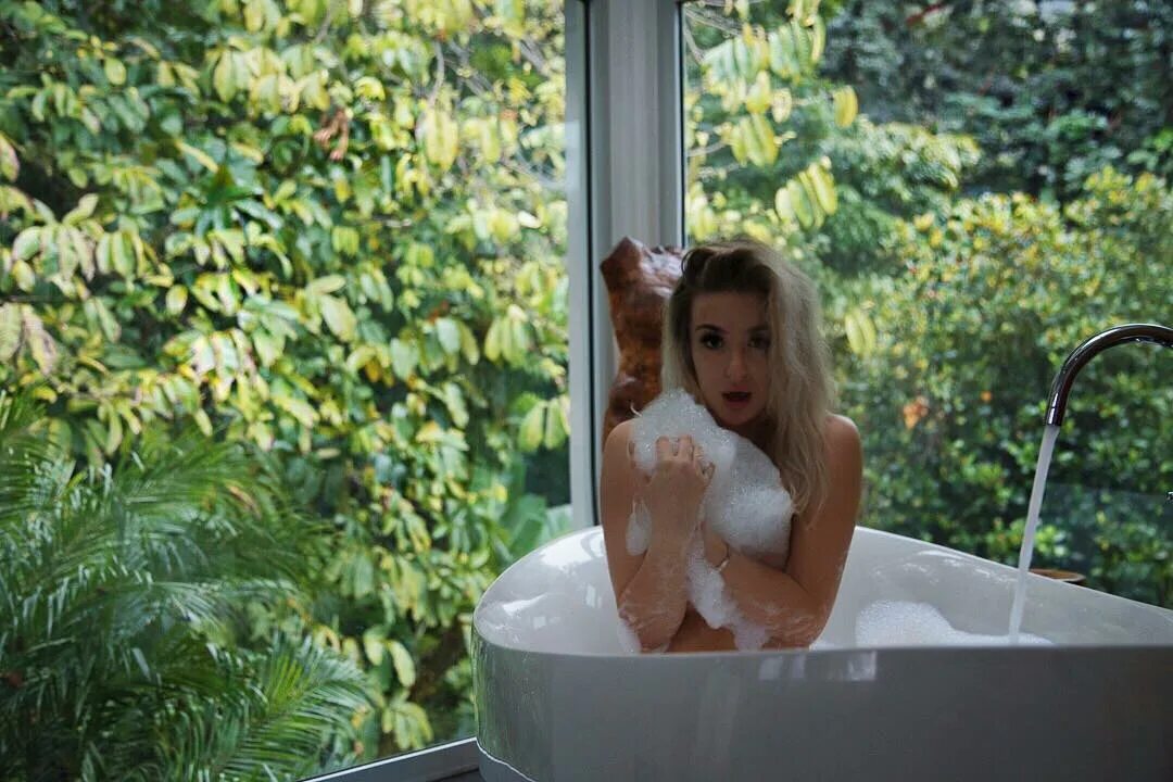 tana mongeau в Instagram: "bathing in holy water" .