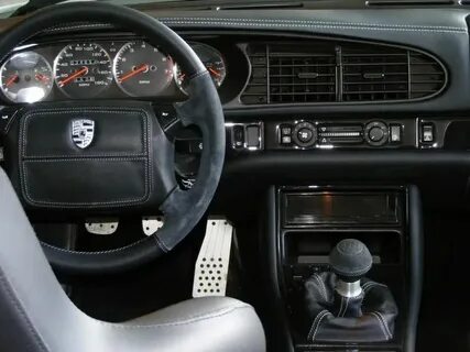 Late Porsche 944 interior with factory sports seats and cust