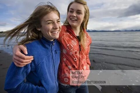 Mediabakery - Photo by Design Pics - Two young women walk ar