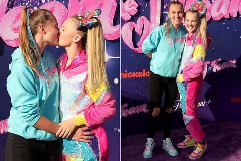 JoJo Siwa kisses girlfriend Kylie Prew during their red carp