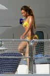 Beyonce Knowles - In a yellow bikini on her yacht in the har