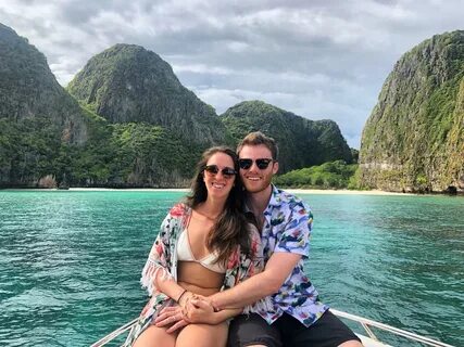 couple seated on boat during daytime photo - Free Vacation I