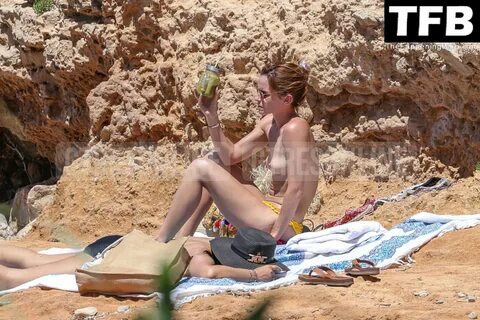 Emma Watson Displays Her Nude Tits on the Beach in Ibiza (77