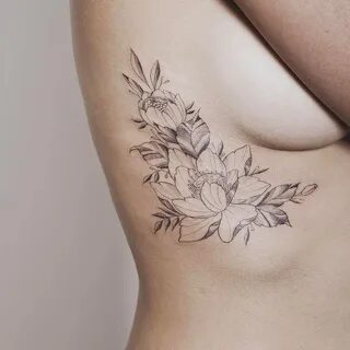 Leaf boob tattoos