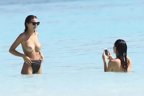 Emily Ratajkowski caught topless at the beach in Cancun