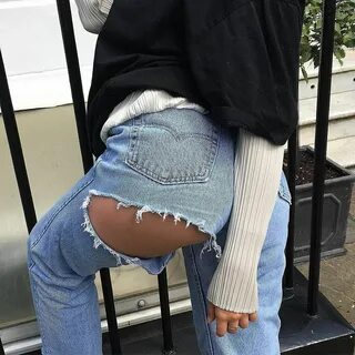Girl wears jeans with golf balls up ass