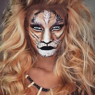 Tiger makup on woman face - Love it 3 Fierce! Halloween cost