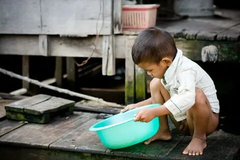 Disposal Saw this kid when we were on a boat ride at Tonle. 