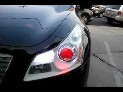 IntoTheCar-g35 custom headlight devil eye on white bazel - Y