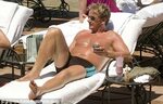 Gordon looks medium to well done as he soaks up the sun in h