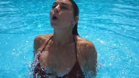 woman emerges water pool attractive girl Stok Videosu (%100 